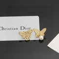 Dior Asymmetric Butterfly Pearl-Look Stud Earrings - product image 1