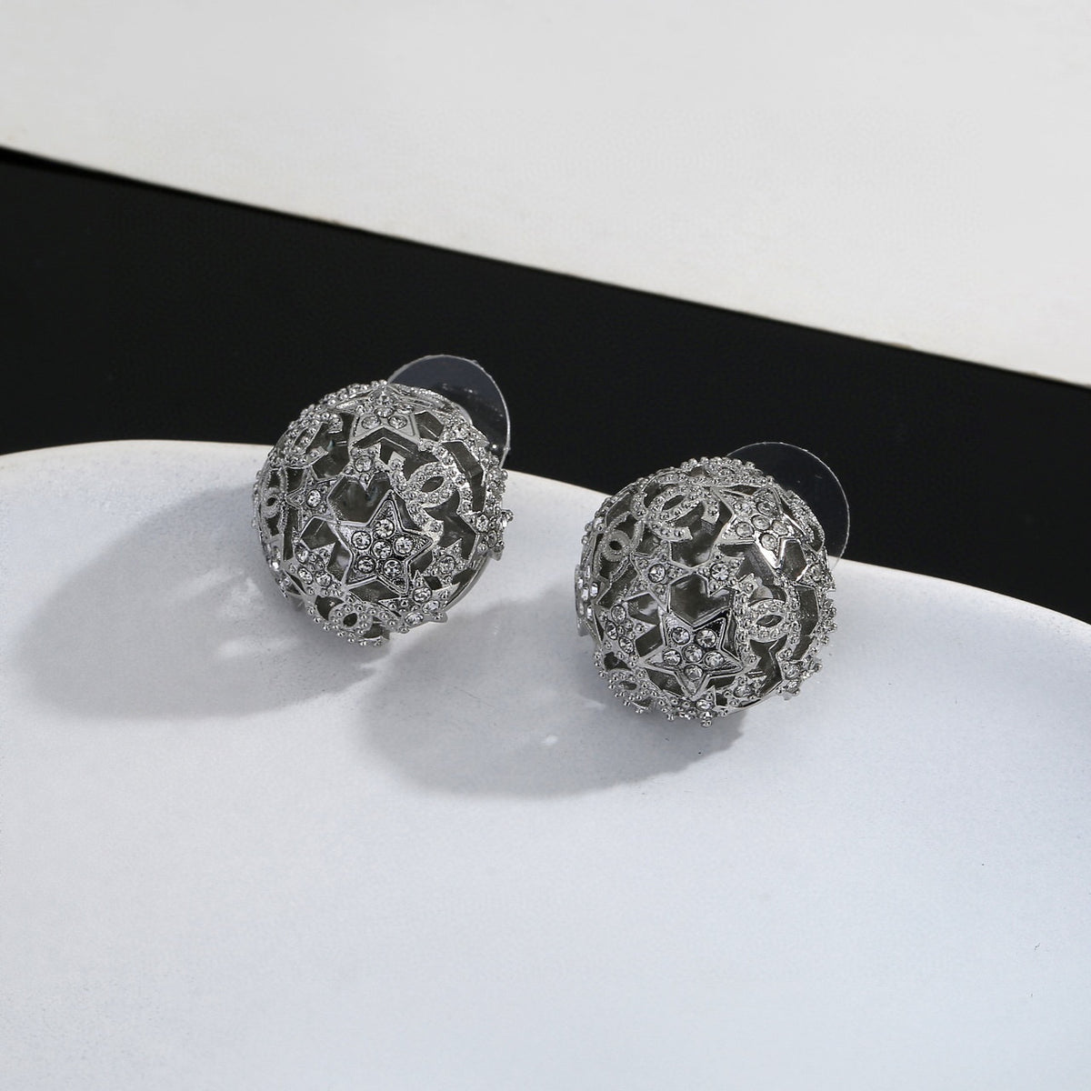 Chanel Star Circular Openwork Stud Earrings - album image 1