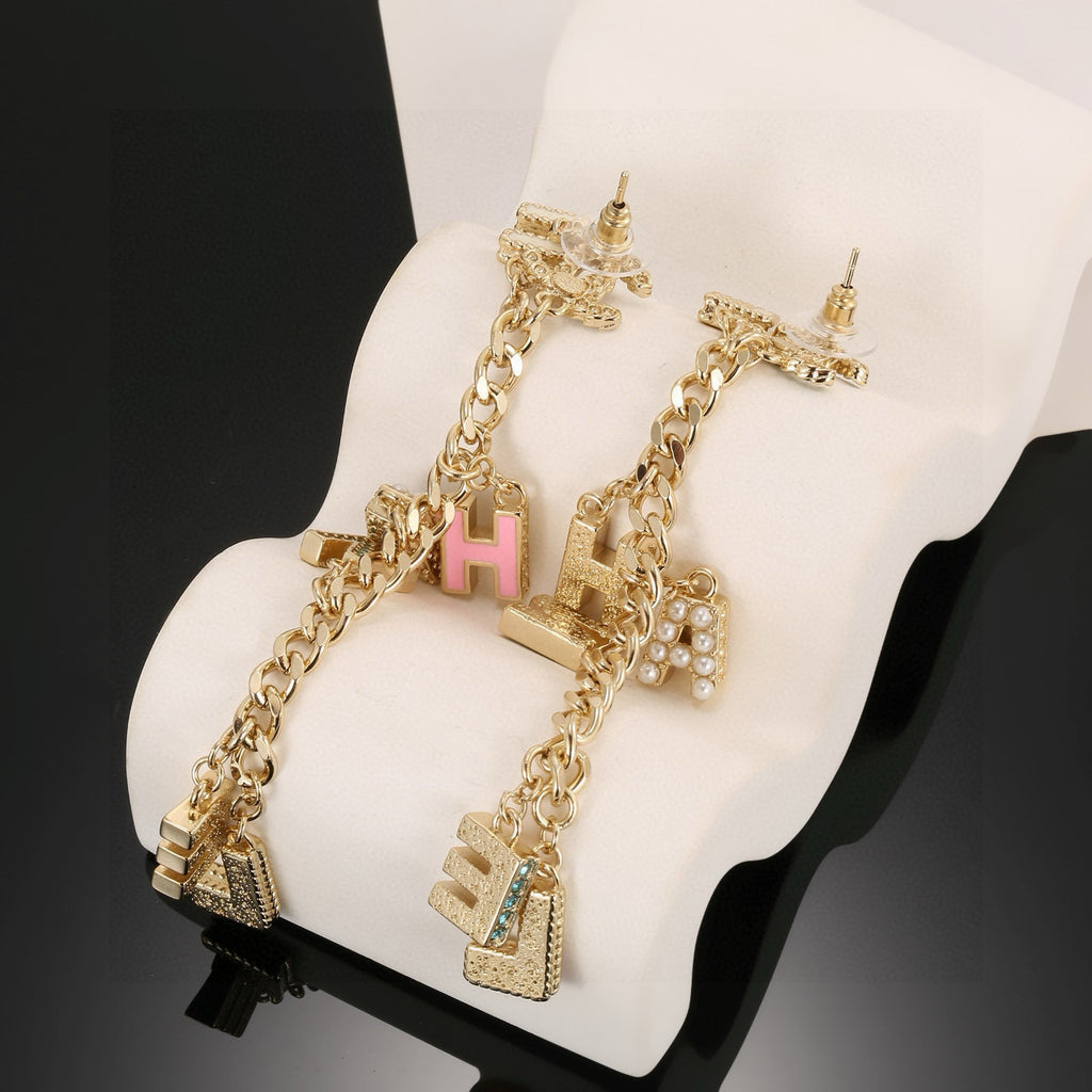 Chanel Enamel Letter Earrings - album image 7