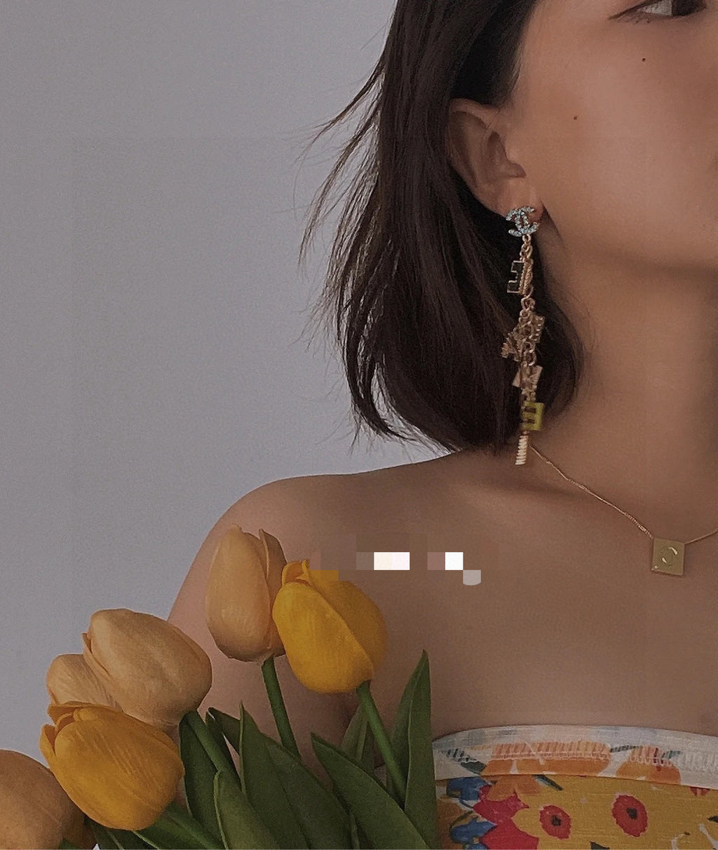 Chanel Enamel Letter Earrings - album image 6