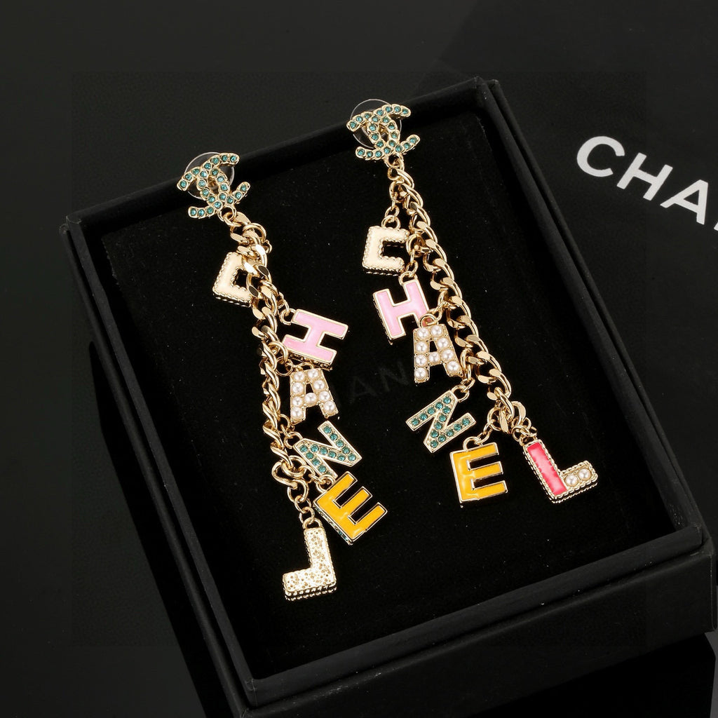 Chanel Enamel Letter Earrings - album image 1