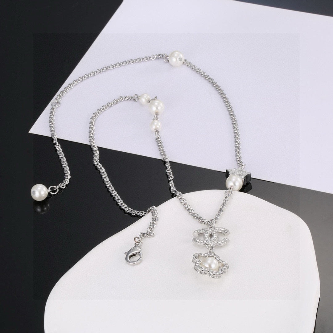 Chanel Interlocking C Camellia Pearl Flower Star Necklace - album image 7