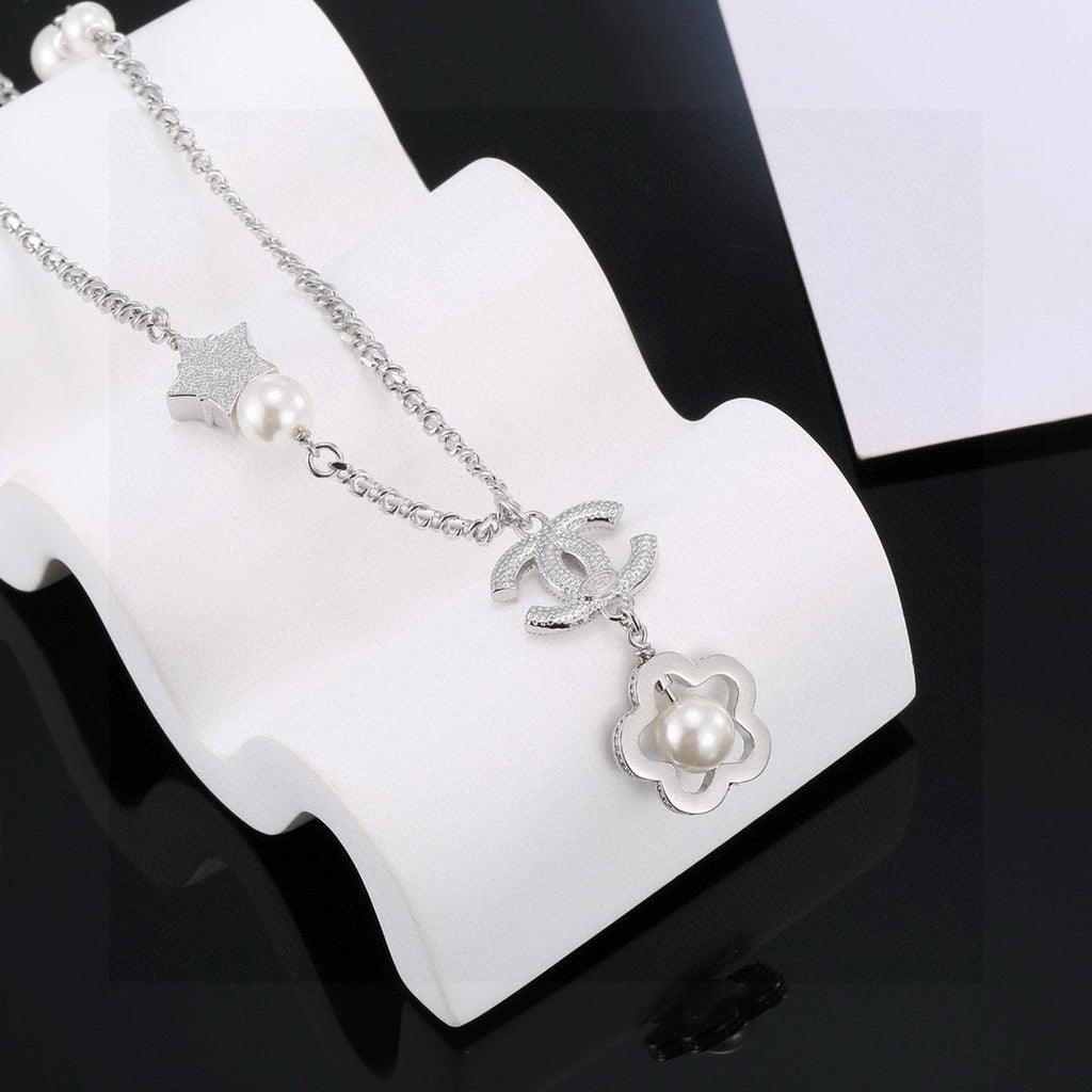 Chanel Interlocking C Camellia Pearl Flower Star Necklace - album image 6