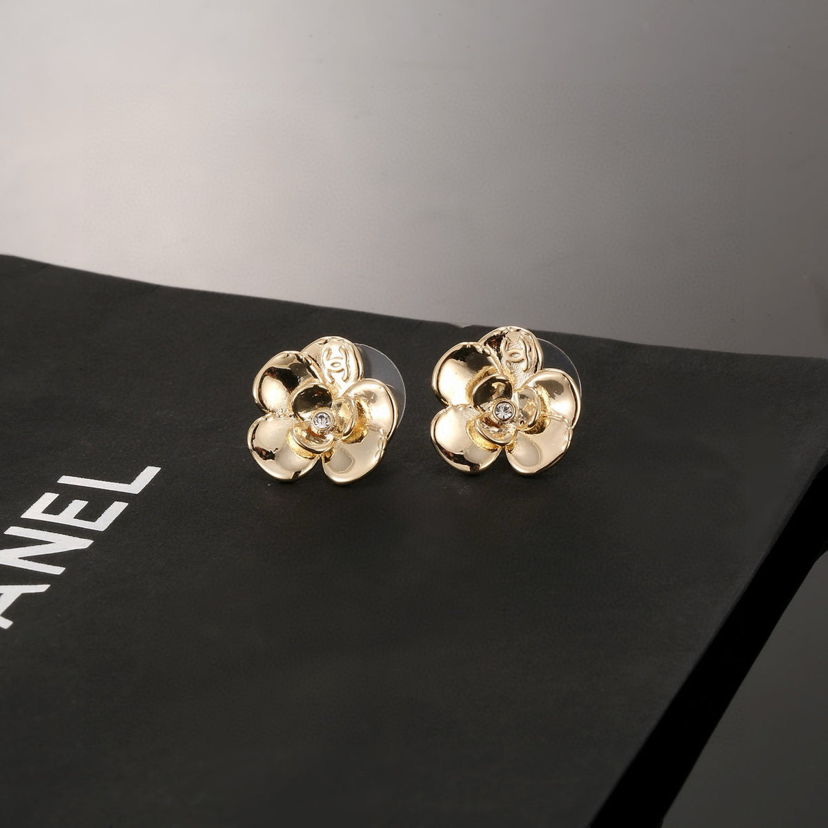 Chanel Interlocking C Camellia Resin Gold-Tone Stud Earrings - album image 6