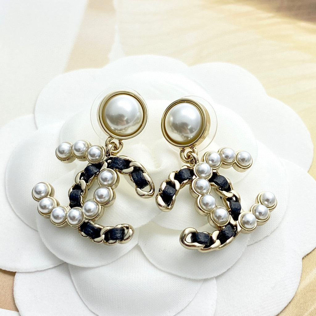 Chanel Interlocking C Gold-Tone Pearl Stud Earrings - album image 5
