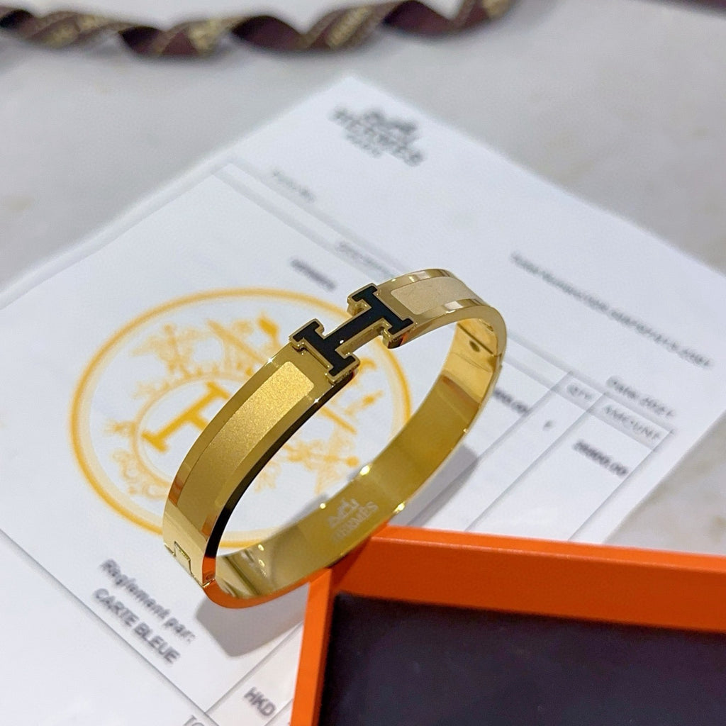 Hermès White Leather Gold-Tone H Bracelet - album image 1
