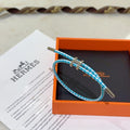 Hermès Turquoise Braided Bracelet - album image 1