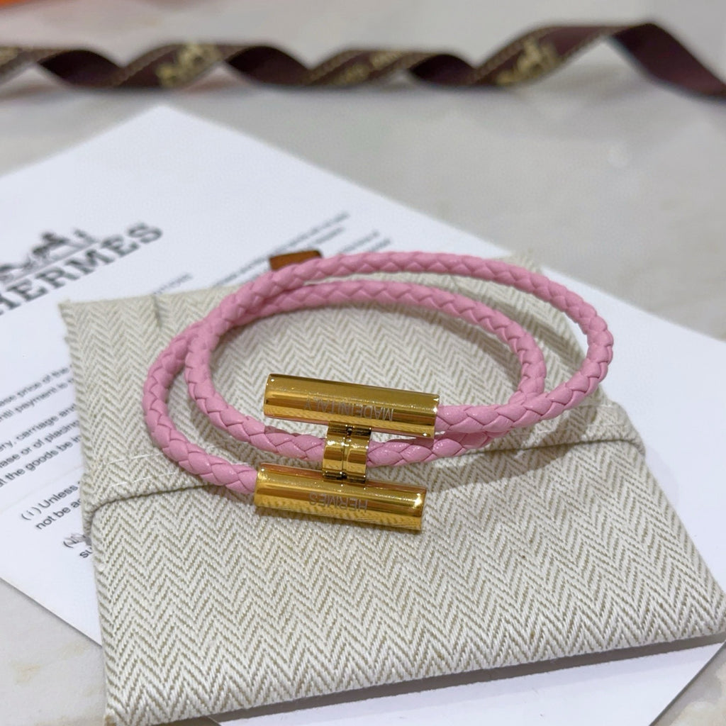 Hermès Pink Braided Gold-Tone H Bracelet - album image 1