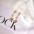 Louis Vuitton Gold-Tone LV and Flower Stud Earrings - album image 1