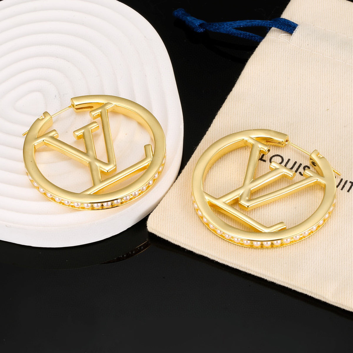 Louis Vuitton LV Letter Stud Earrings - album image 4