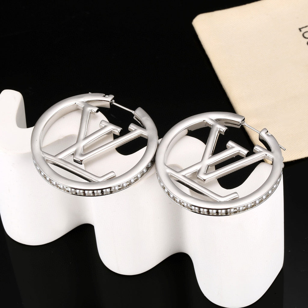 Louis Vuitton LV Letter Stud Earrings - album image 3
