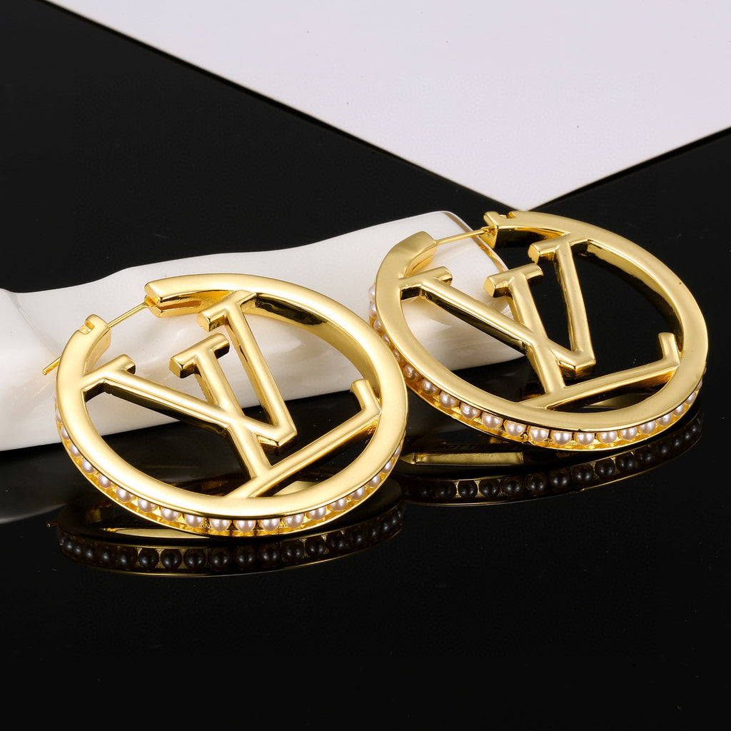 Louis Vuitton LV Letter Stud Earrings - album image 2