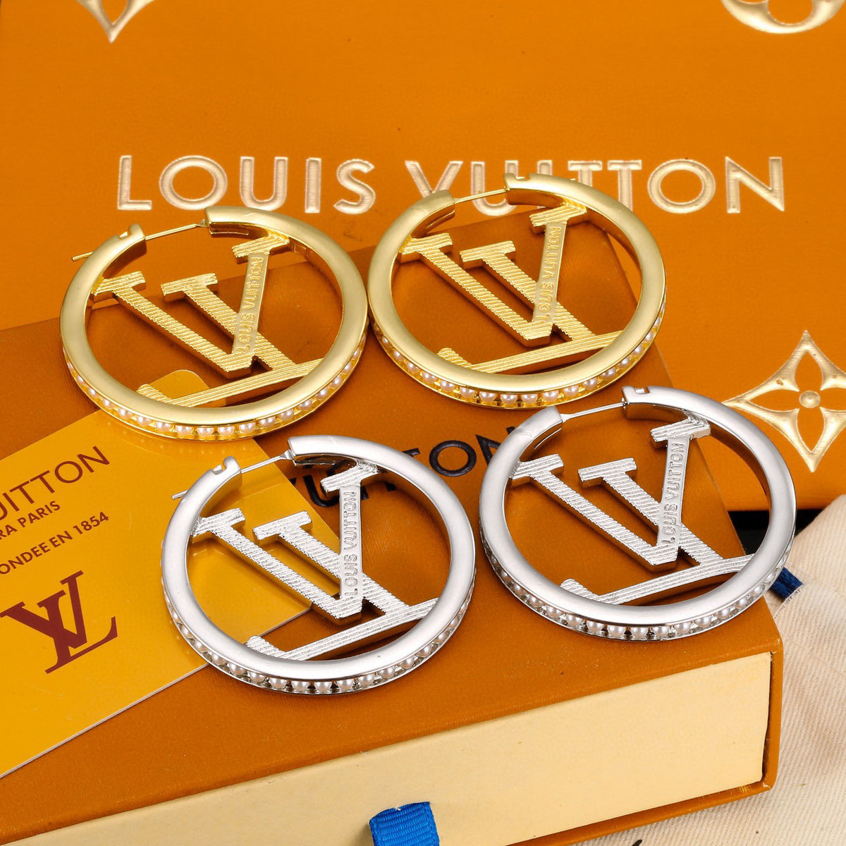 Louis Vuitton LV Letter Stud Earrings - album image 6