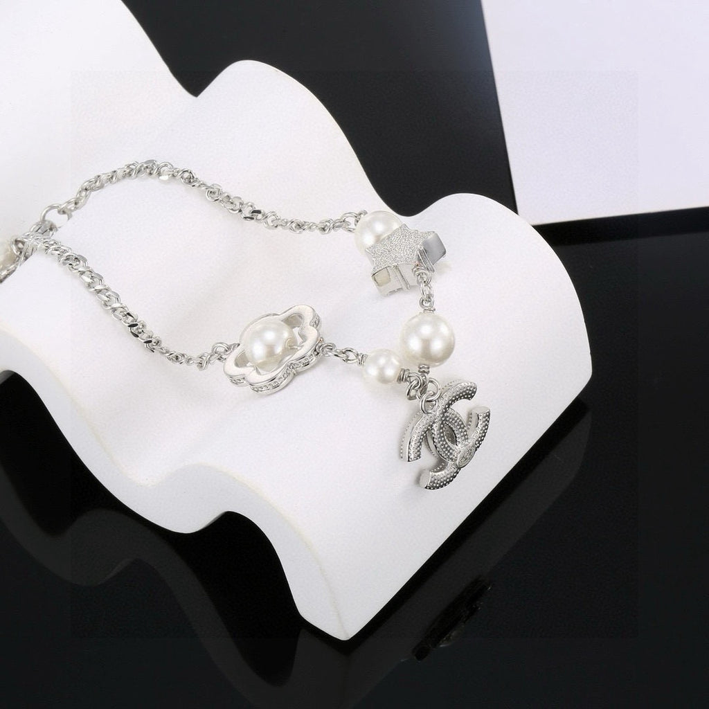 Chanel Camellia Pearl Star Bracelet - album image 9