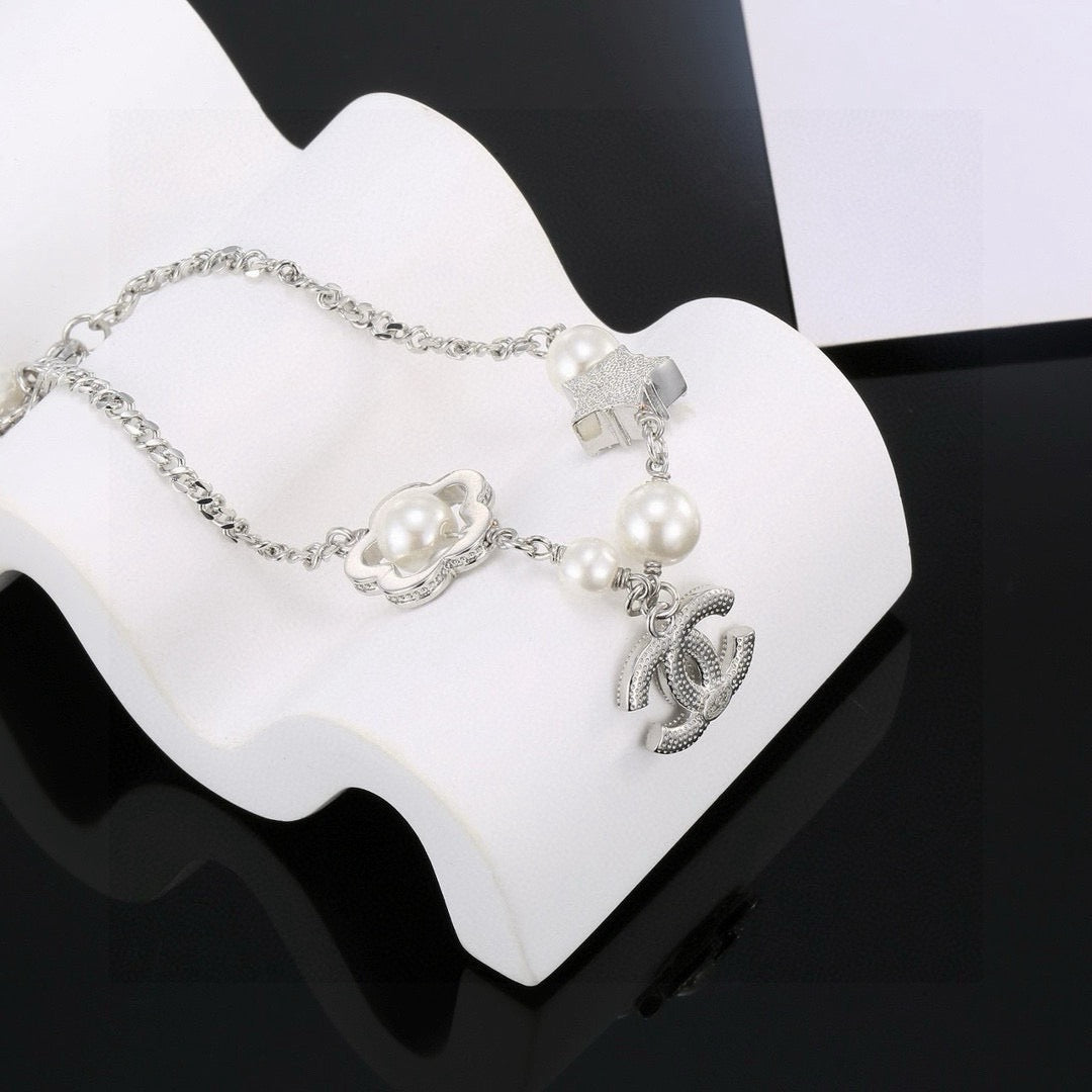Chanel Camellia Pearl Star Bracelet - album image 9