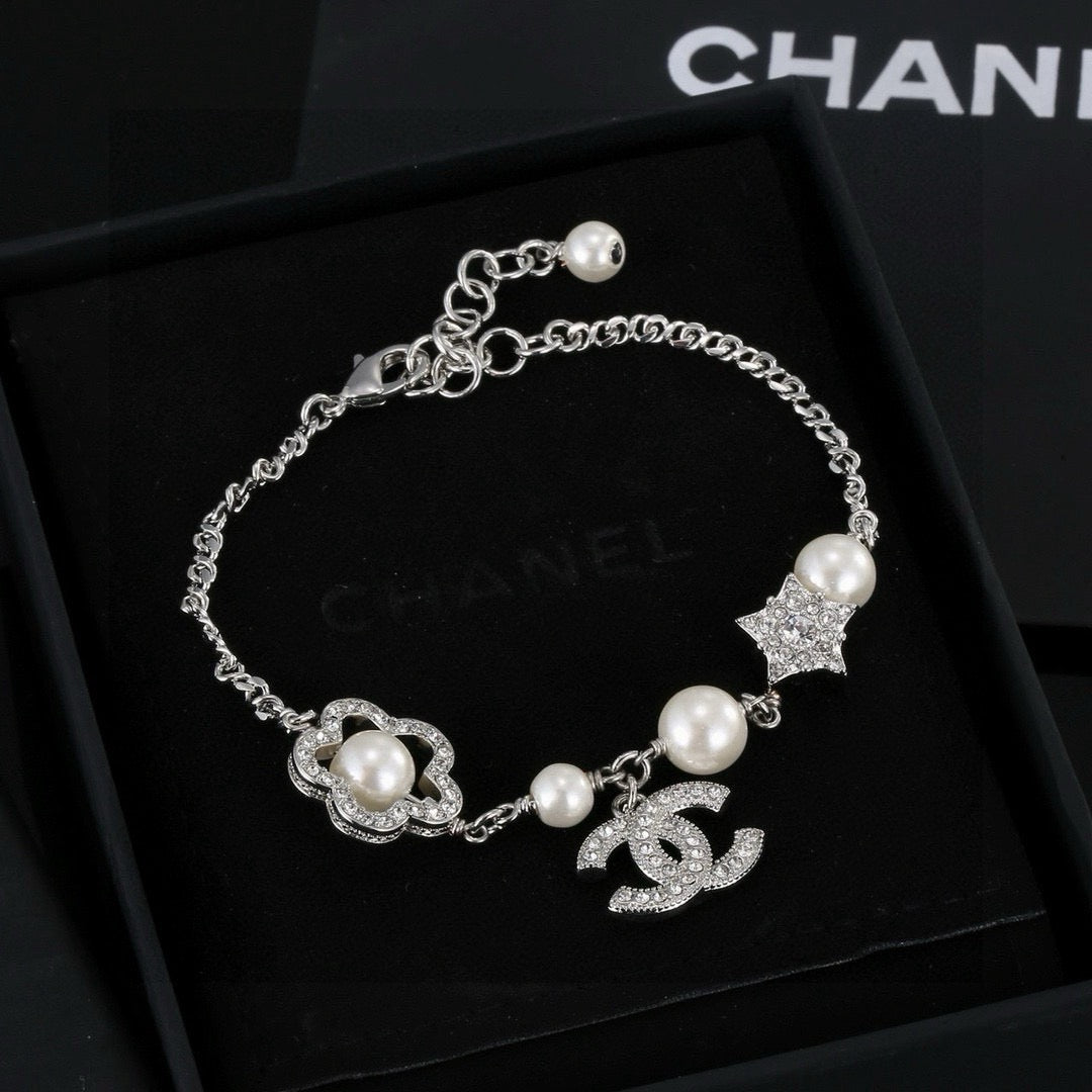 Chanel Camellia Pearl Star Bracelet - album image 1
