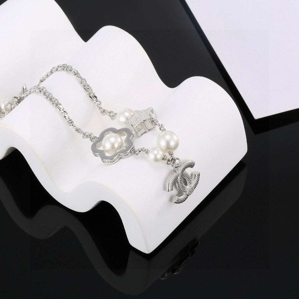 Chanel Camellia Pearl Star Bracelet - album image 6