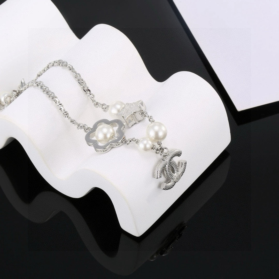 Chanel Camellia Pearl Star Bracelet - album image 6