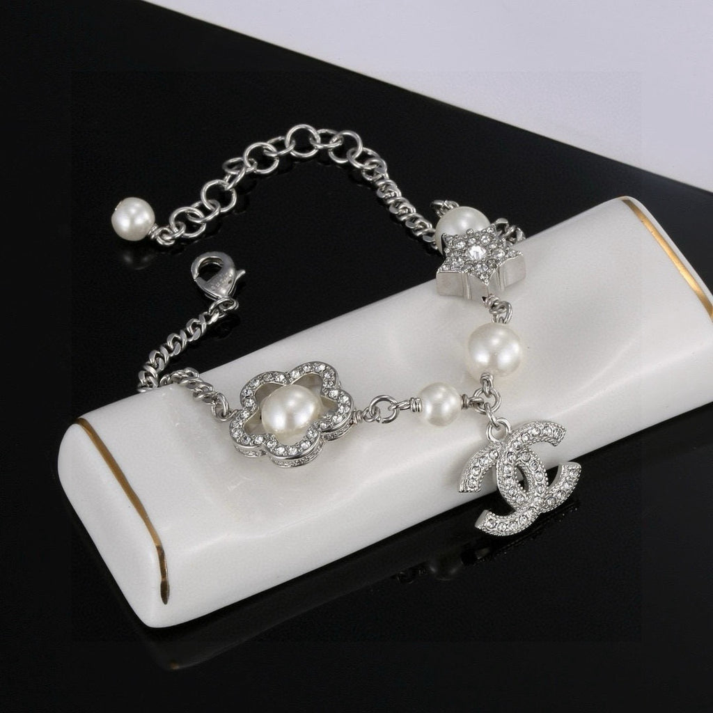 Chanel Camellia Pearl Star Bracelet - album image 7