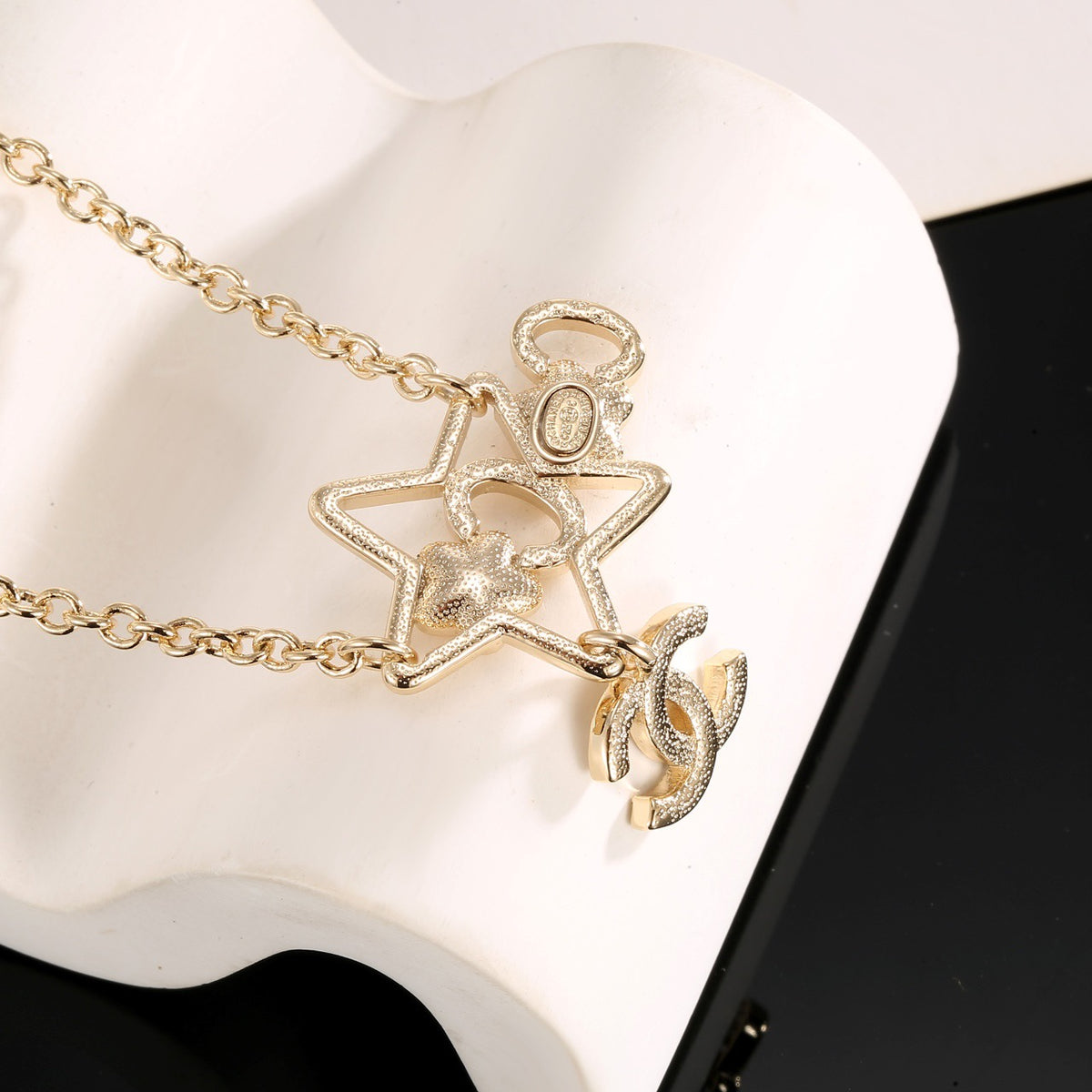 Chanel Interlocking C Star Necklace - album image 9