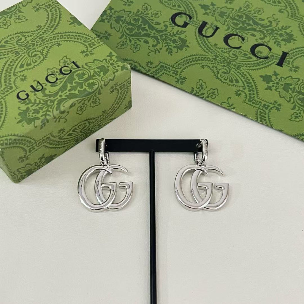 Gucci Interlocking G Drop Earrings in Gold and Silver Tones - album image 6