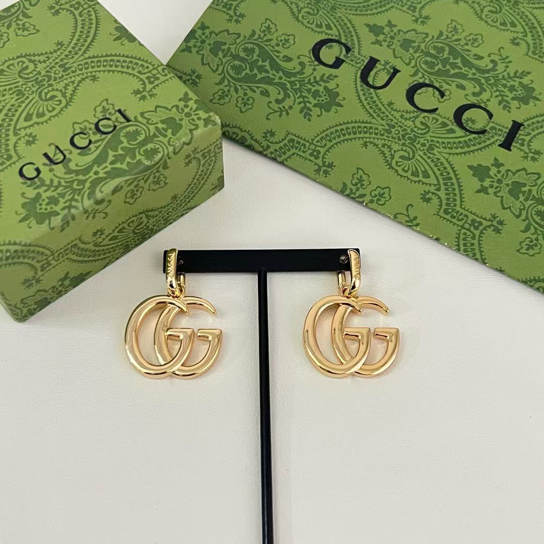 Gucci Interlocking G Drop Earrings in Gold and Silver Tones - album image 9