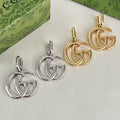 Gucci Interlocking G Drop Earrings in Gold and Silver Tones - album image 1