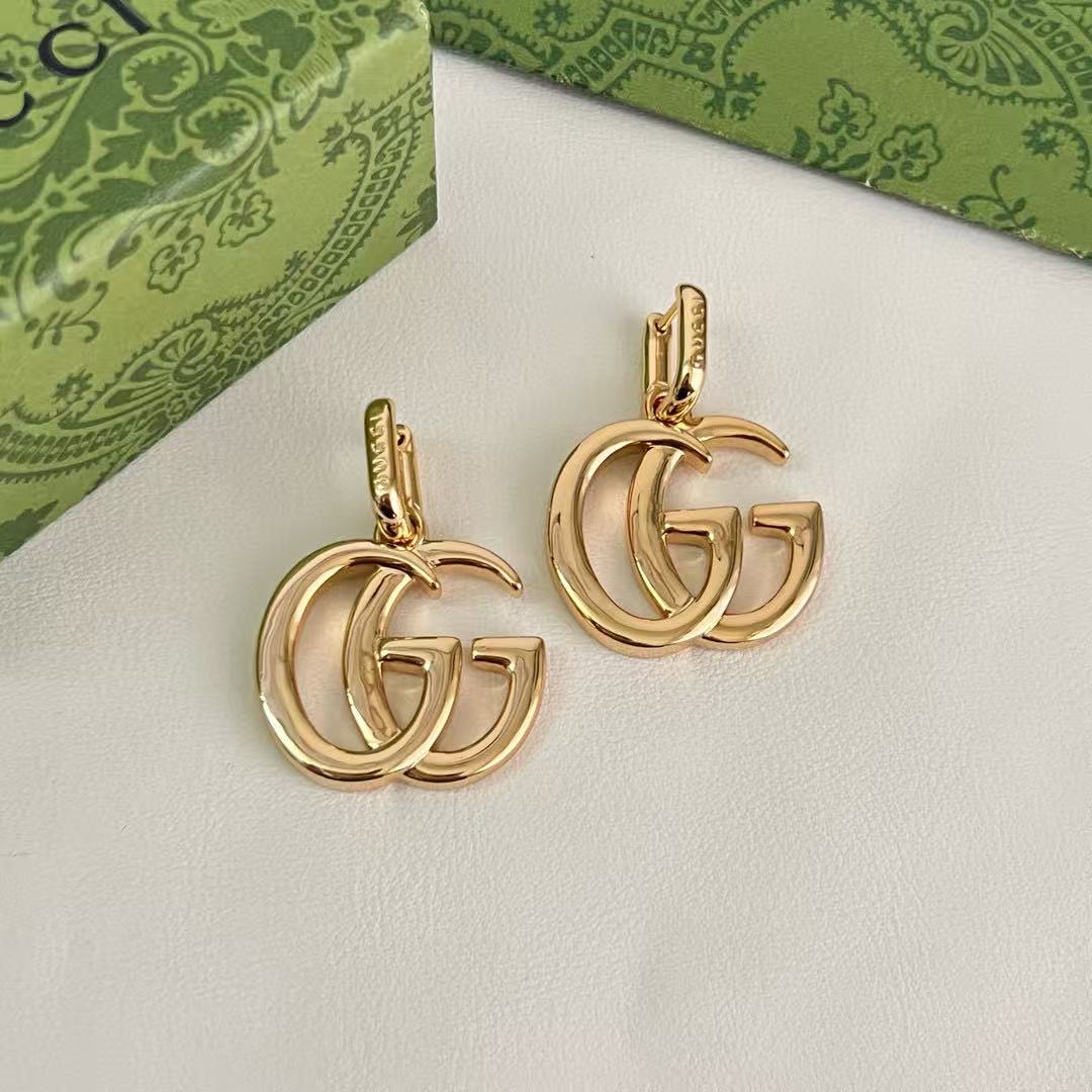 Gucci Interlocking G Drop Earrings in Gold and Silver Tones - album image 7