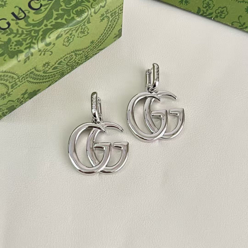 Gucci Interlocking G Drop Earrings in Gold and Silver Tones - album image 8
