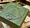 Gucci Silver-Tone Heart Charm Beaded Bracelet - album image 1
