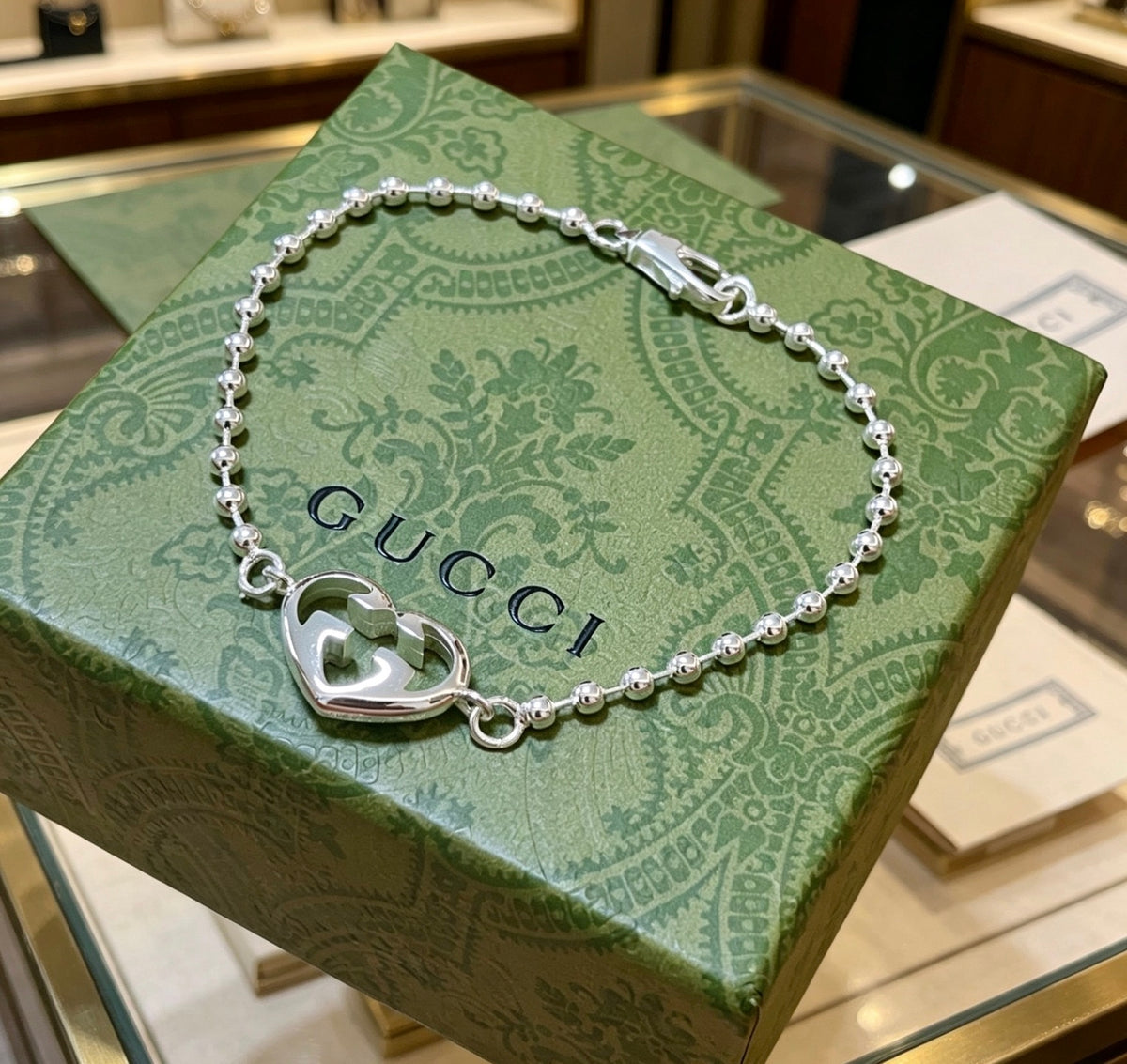 Gucci Silver-Tone Heart Charm Beaded Bracelet - album image 1