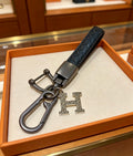 Hermès Black Strap H Keychain - album image 1