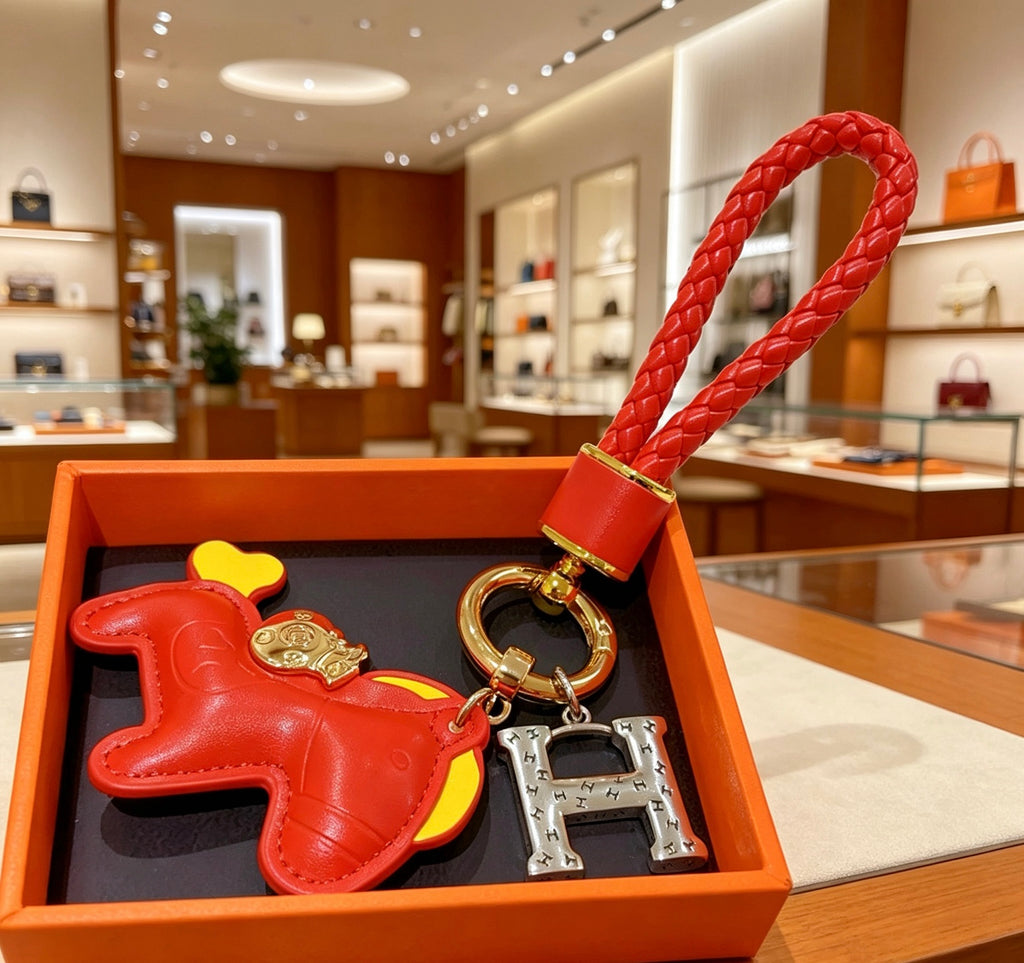 Hermès Red Horse and Gold-Tone H Charm Keychain - album image 1