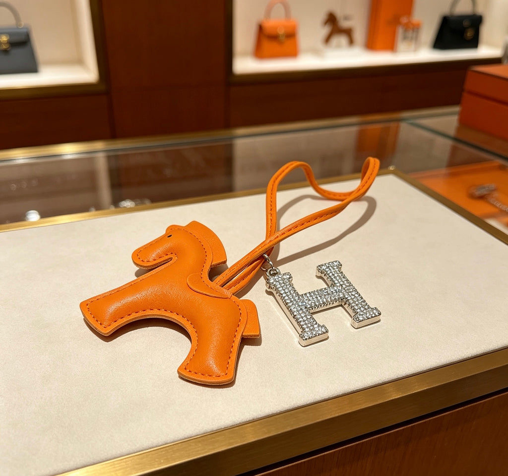 Hermès Orange Leather Horse Bag Charm - album image 5