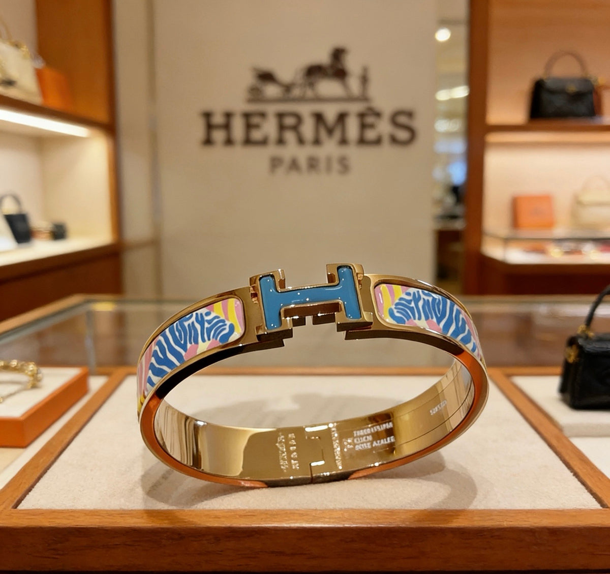 Hermès Gold-Tone Blue Printed H-Clasp Bangle - album image 1