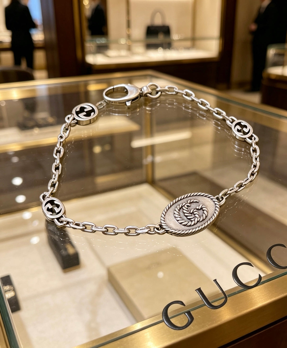 Gucci Silver-Tone Coin Charm Bracelet - album image 1
