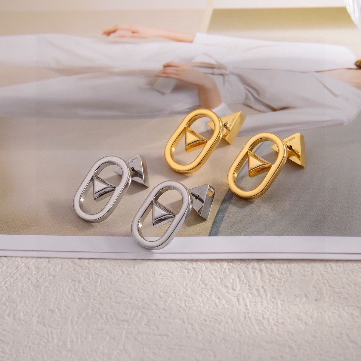Prada Gold-Tone Triangle Link Earrings - album image 1