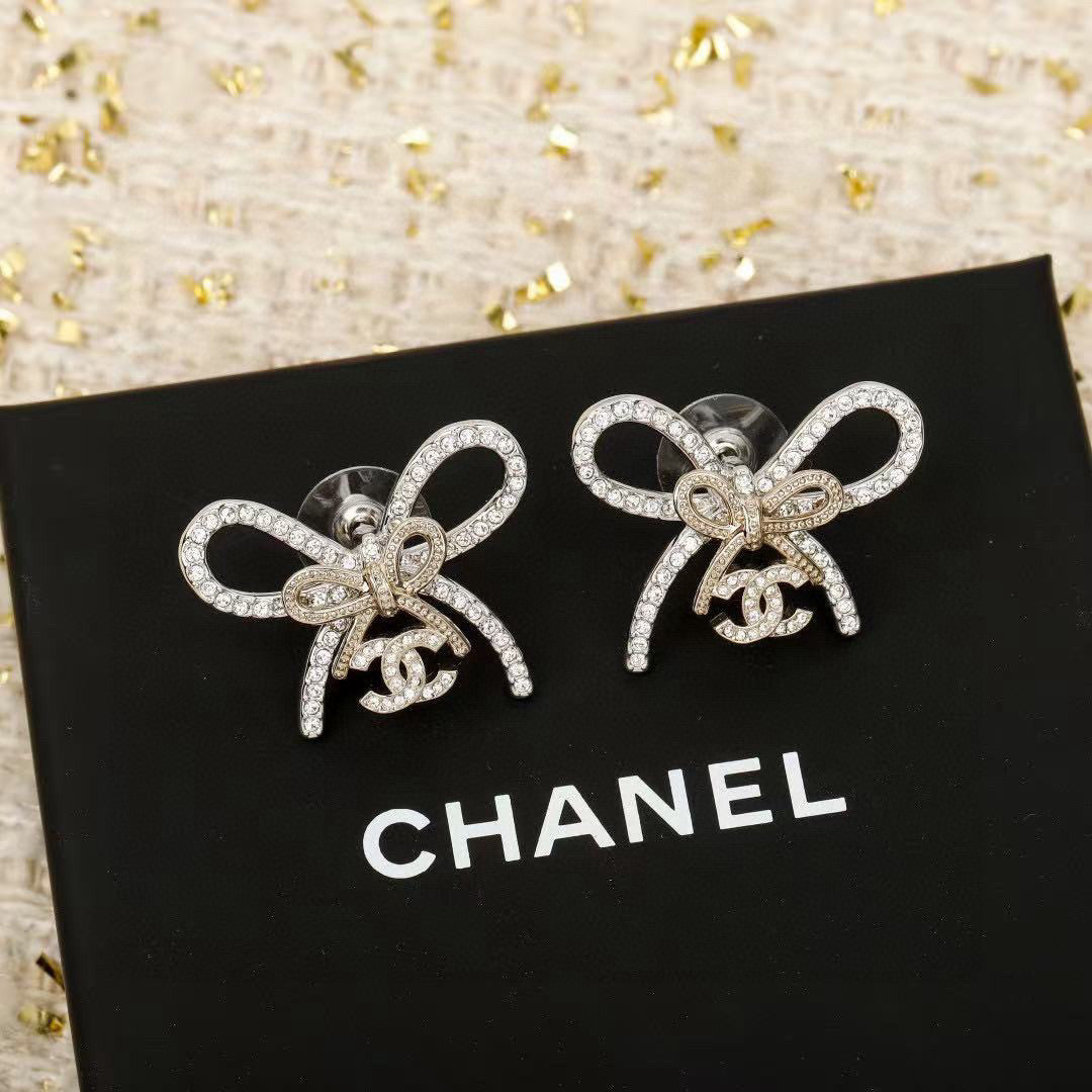 Chanel Interlocking C Bow Butterfly Earrings - album image 1