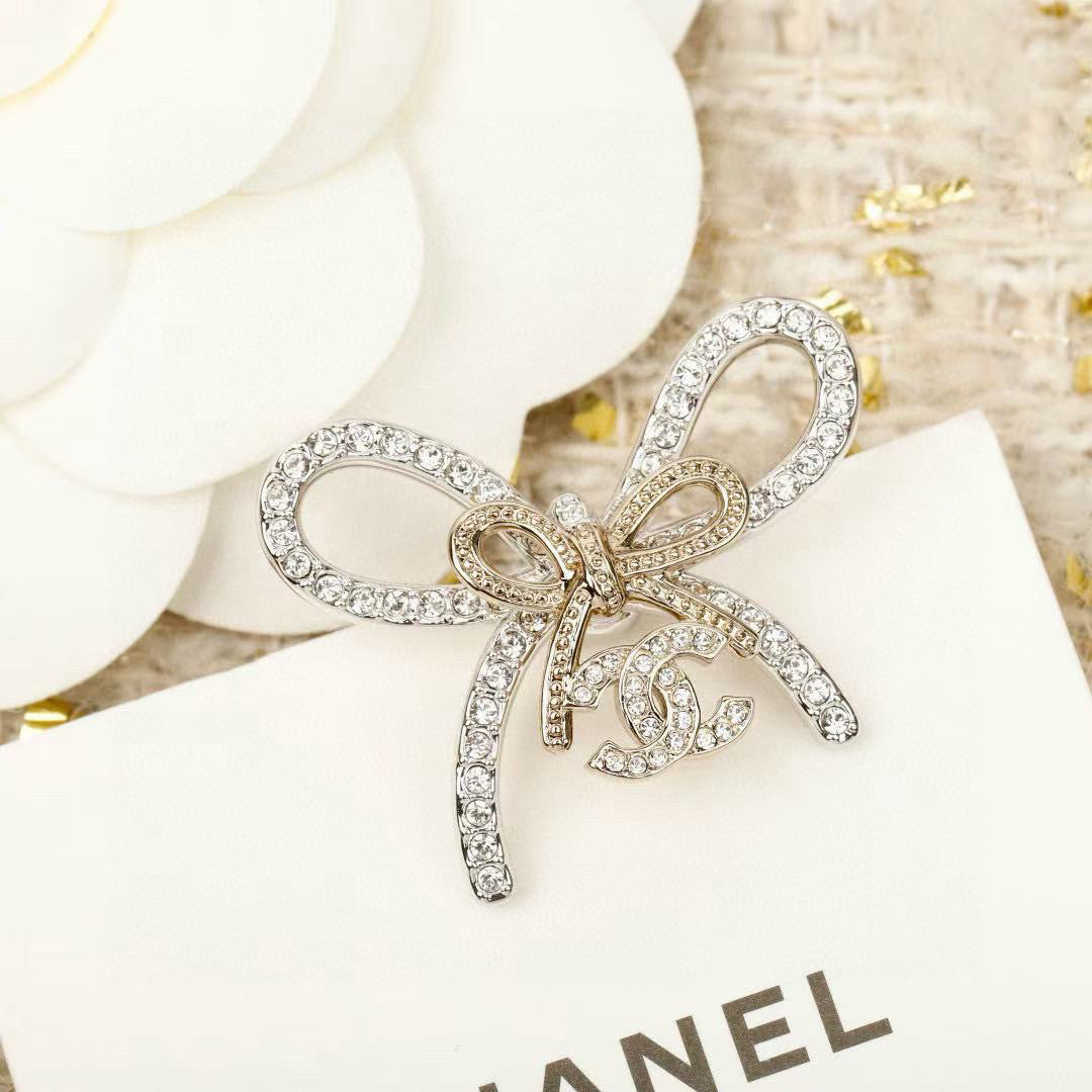 Chanel Interlocking C Bow Butterfly Earrings - album image 5
