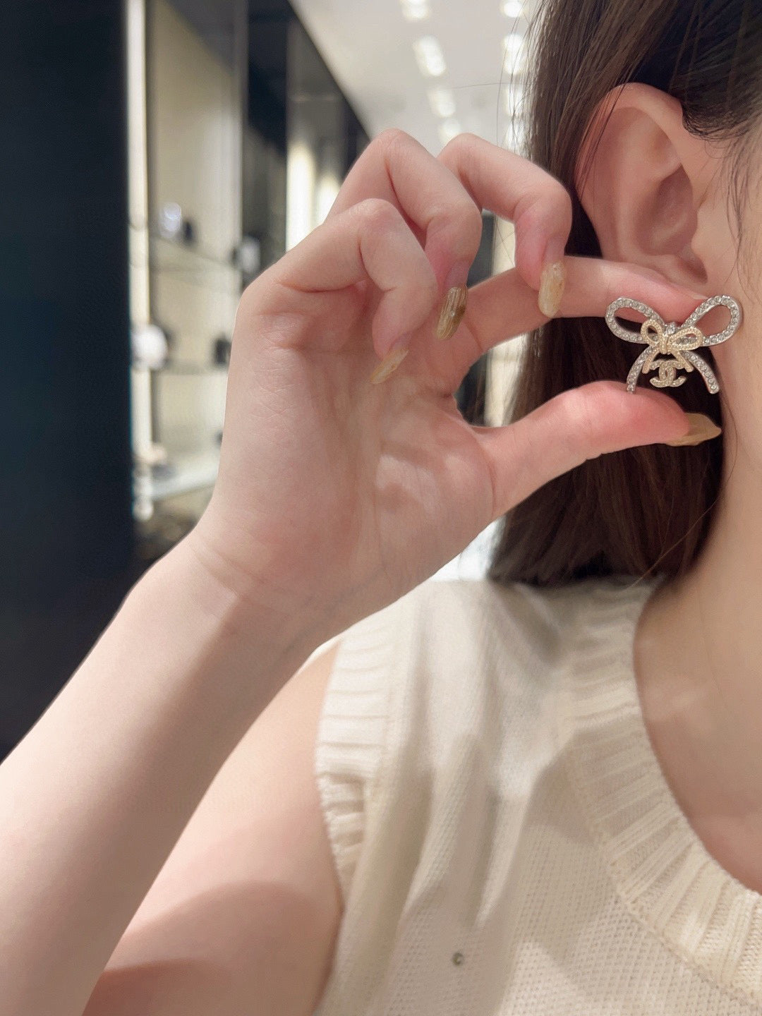 Chanel Interlocking C Bow Butterfly Earrings - album image 3