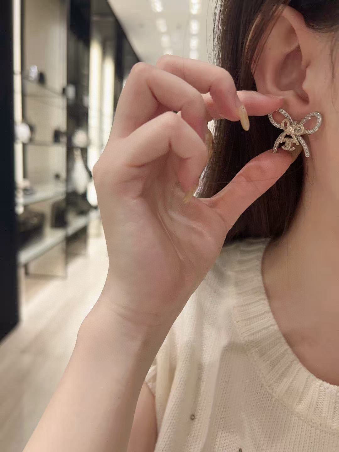 Chanel Interlocking C Bow Butterfly Earrings - album image 2