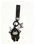 Louis Vuitton Black Bear Keychain with Dark Strap - album image 1