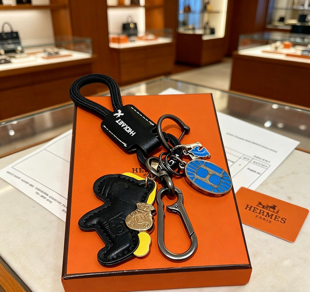 Hermès Black Horse Keychain with Black Braided Cord - album image 4