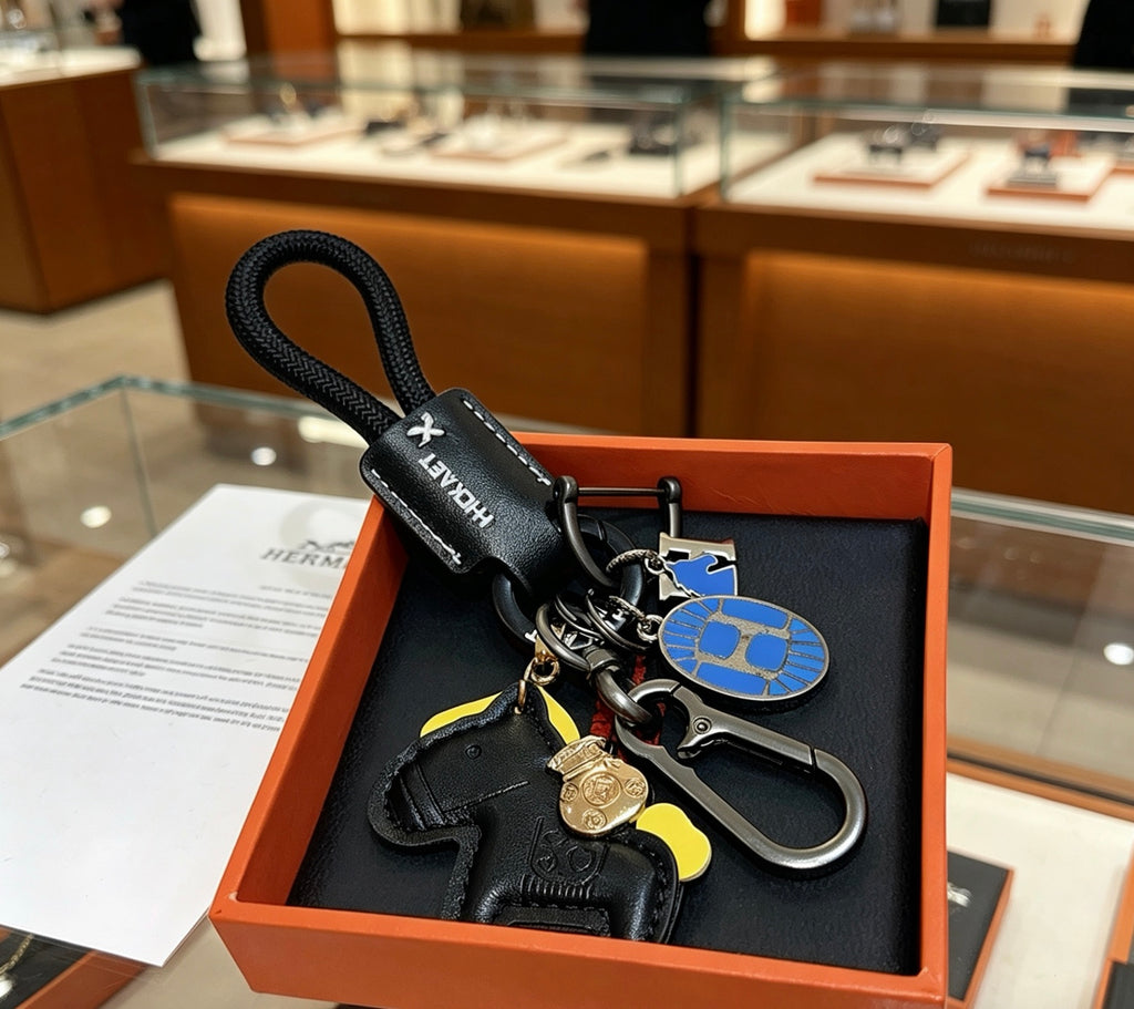 Hermès Black Horse Keychain with Black Braided Cord - album image 3