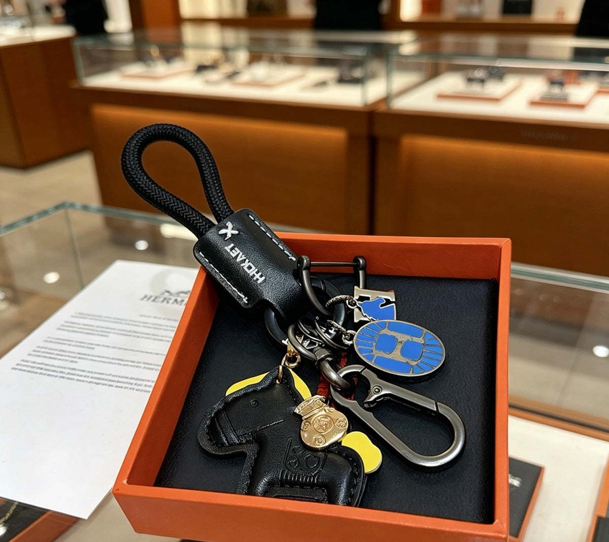 Hermès Black Horse Keychain with Black Braided Cord - album image 3