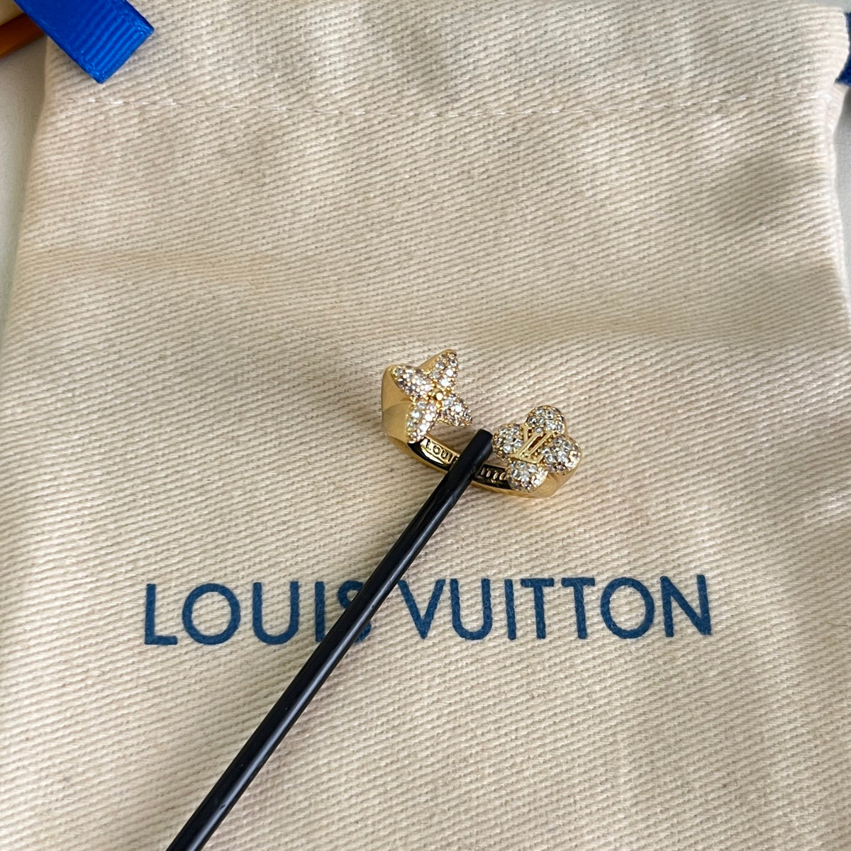 Louis Vuitton Gold-Tone Circular Ring - album image 4