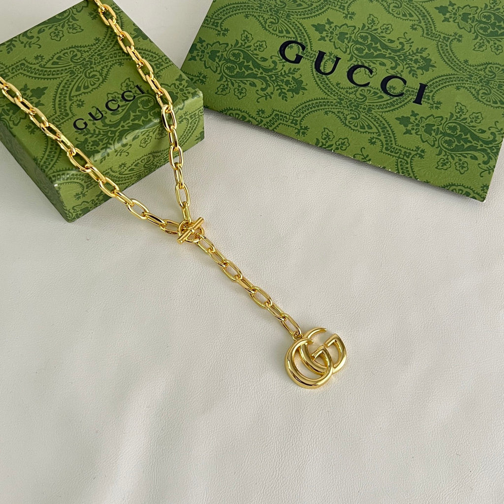 Gucci Gold-Tone Round Medallion Pendant Necklace - album image 1
