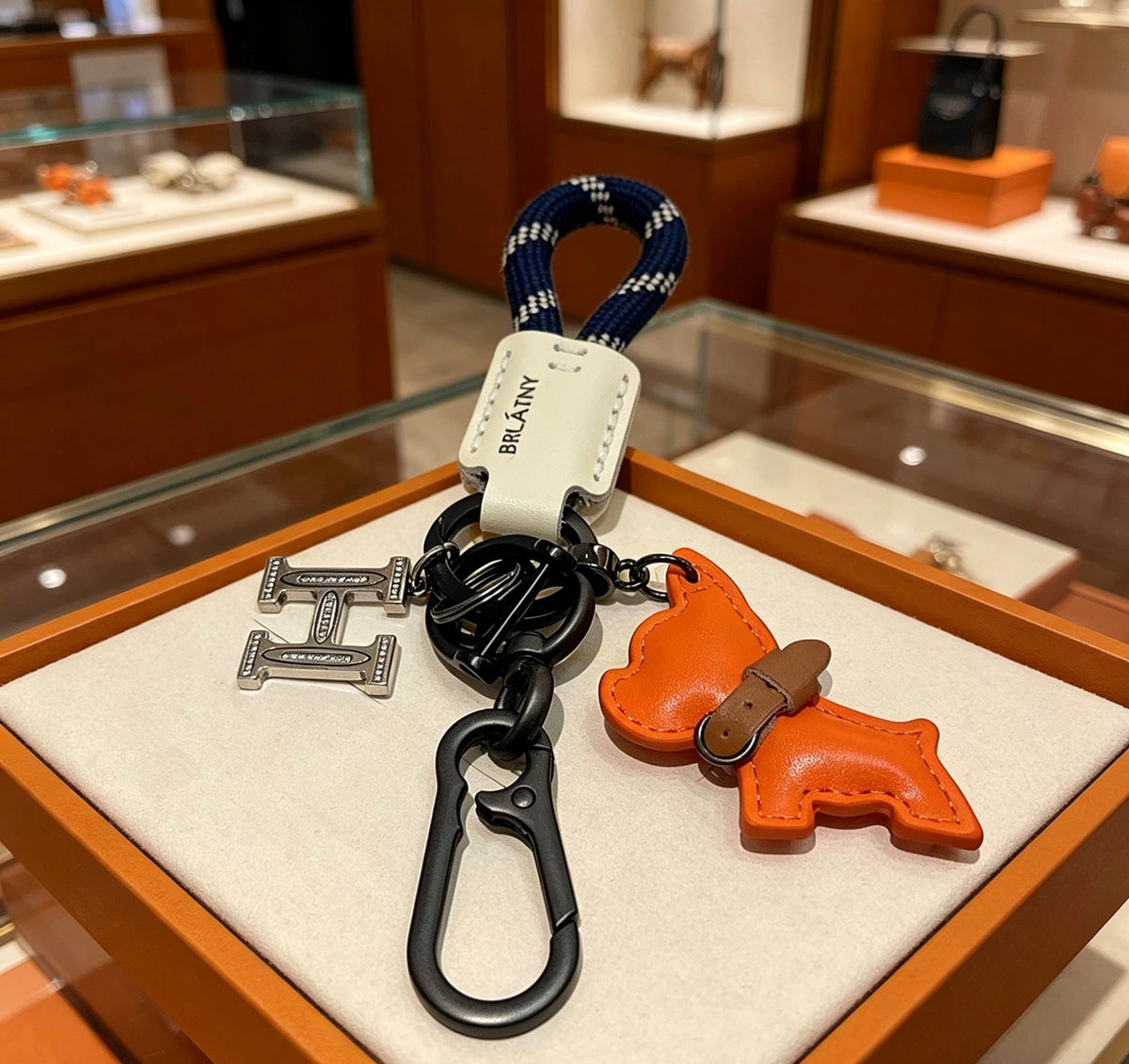 Hermès Orange Horse and H-Charm Keychain with Navy Strap - album image 1