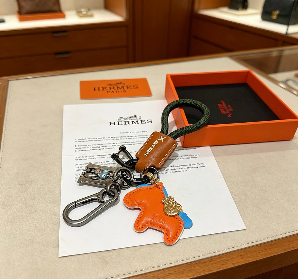 Hermès Orange Horse Keychain with Brown Strap - album image 2