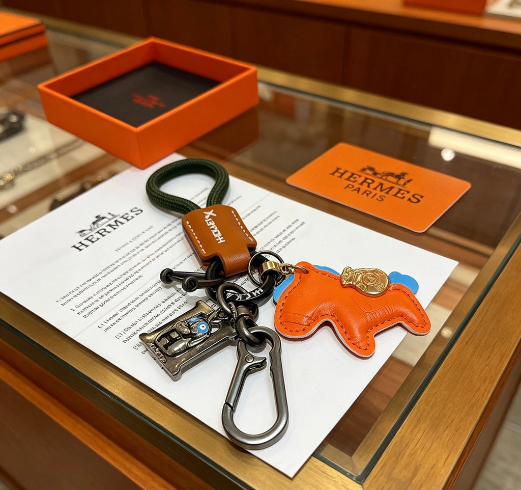 Hermès Orange Horse Keychain with Brown Strap - album image 5